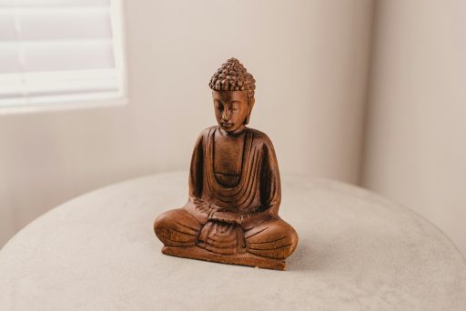 Gautama figurine on table