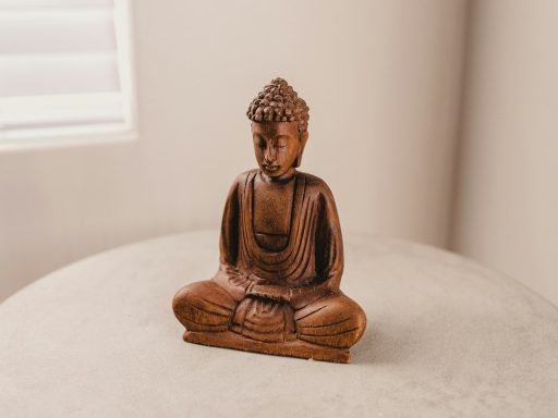 Gautama figurine on table